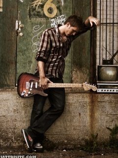alone boy with guitar